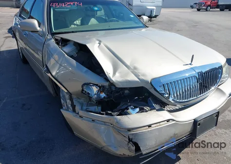 2004 Lincoln Town Car Signature из США, поврежденный, VIN 1LNHM81W44Y617901